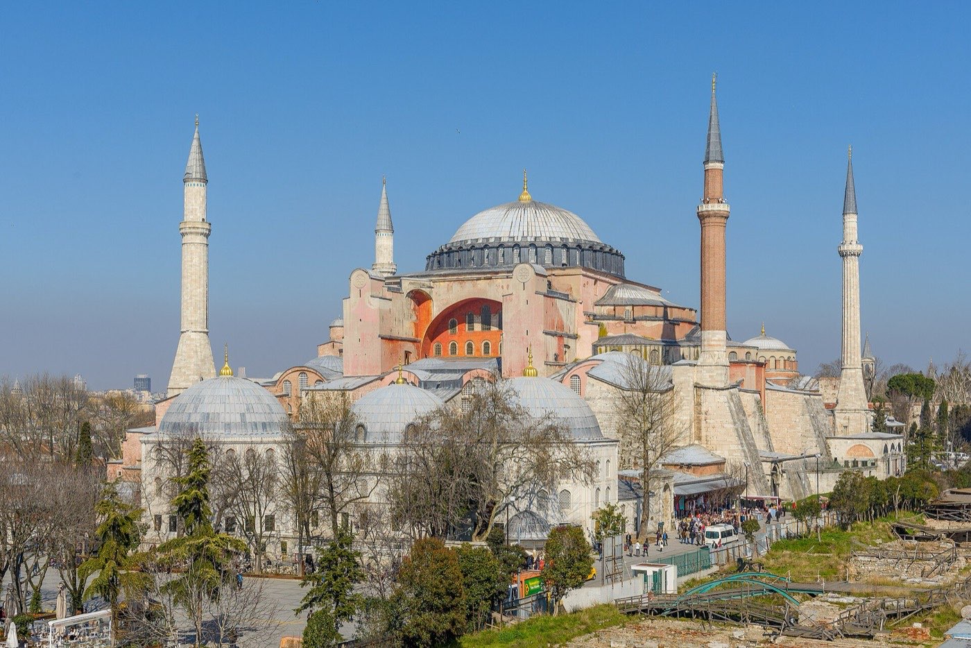 Hagia Sophia's grey dome, buttresses and four minarets seen from across Sultanahmet